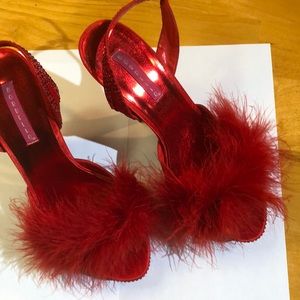 Red feather high heels